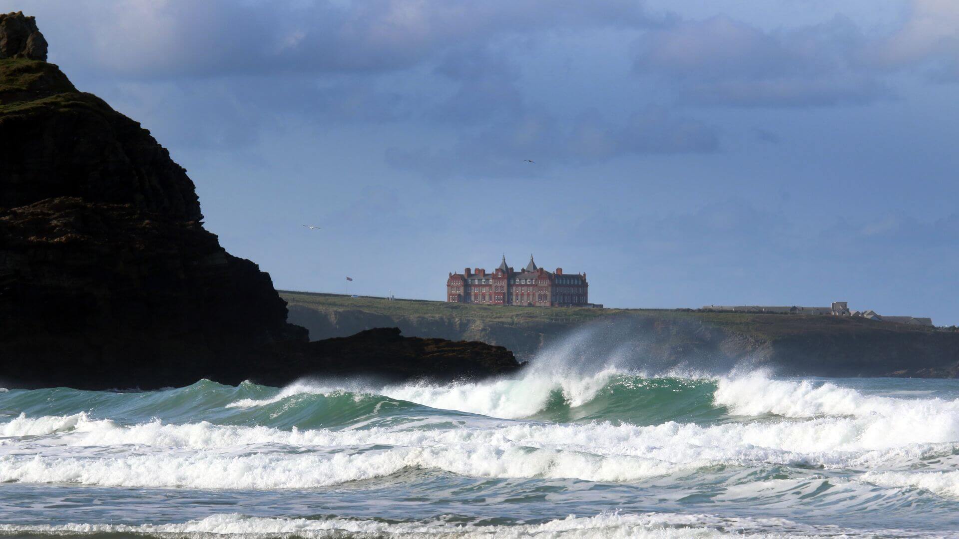 The Headland Hotel as pictured from afar from Fistral Beach, Newquay, Cornwall
